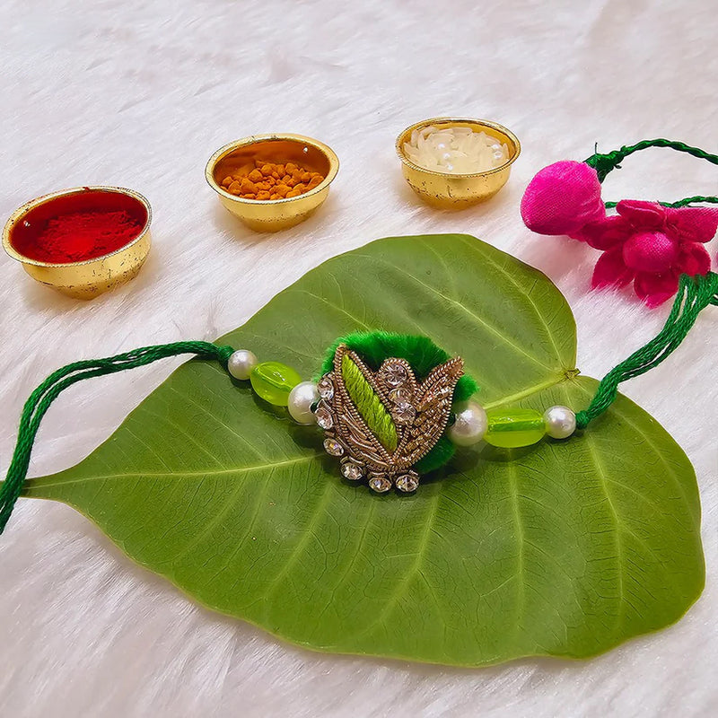 Rakhi with Green Leaf